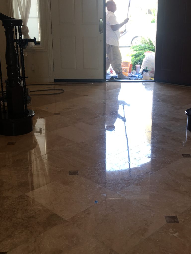 Polished and sealed travertine